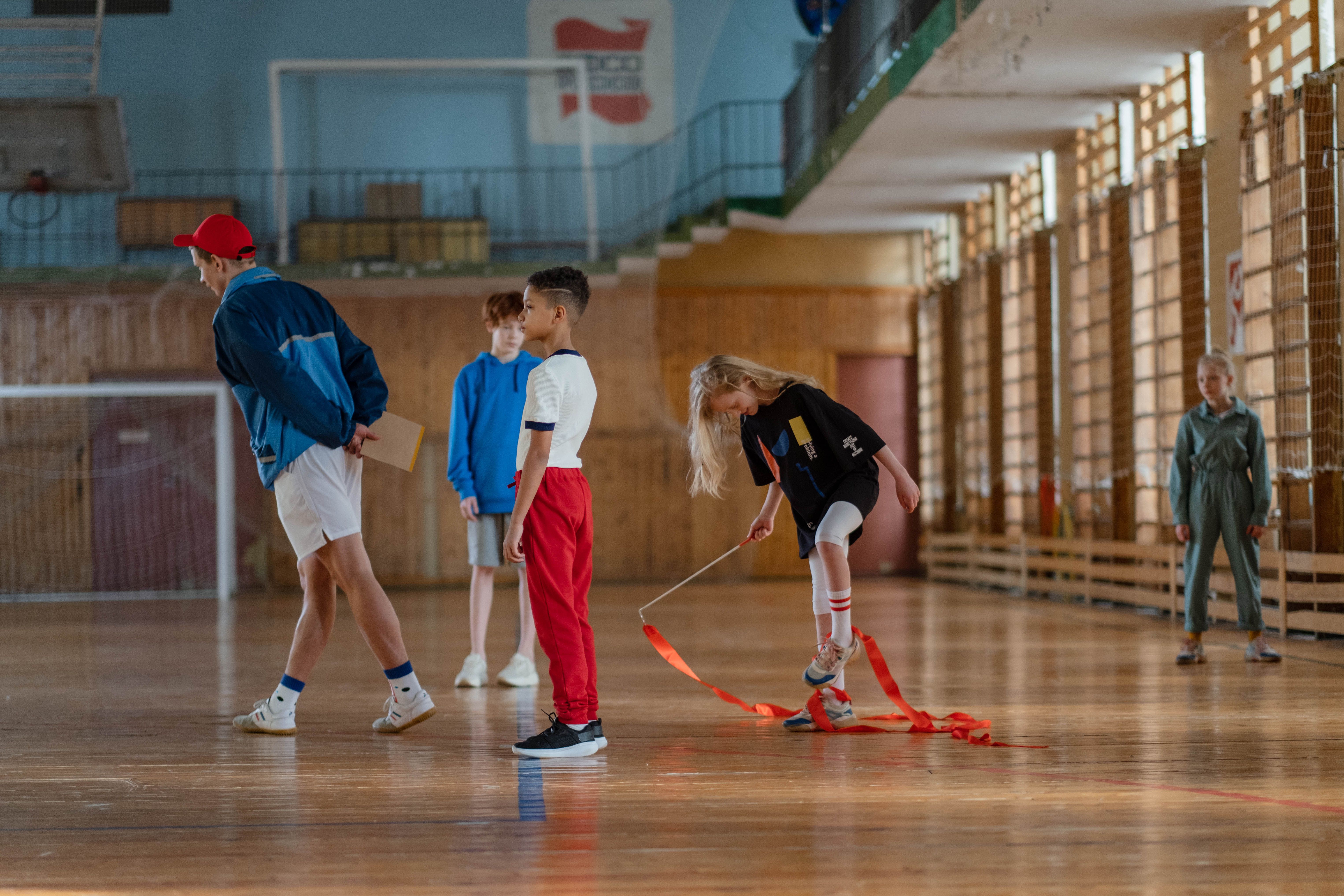 Children exercising in a school sports hall