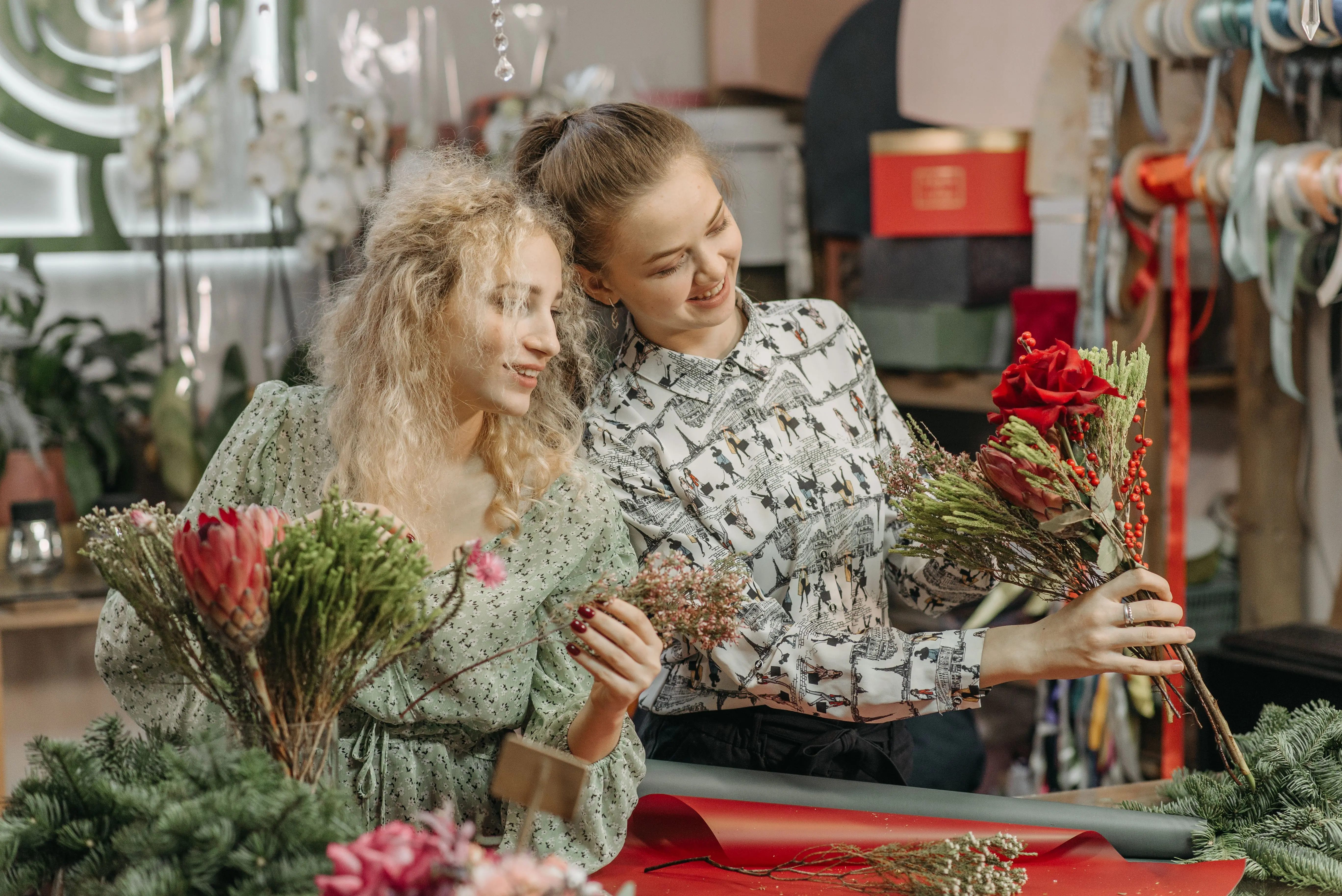 Florist arranging flowers in a shop